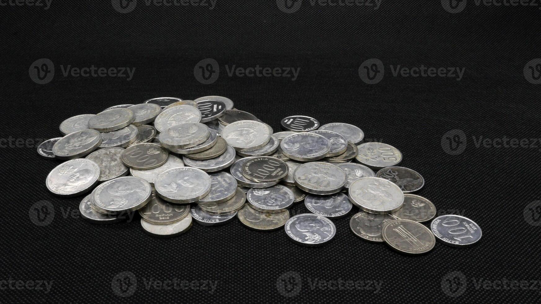 Stack of Indonesian coins isolated photo