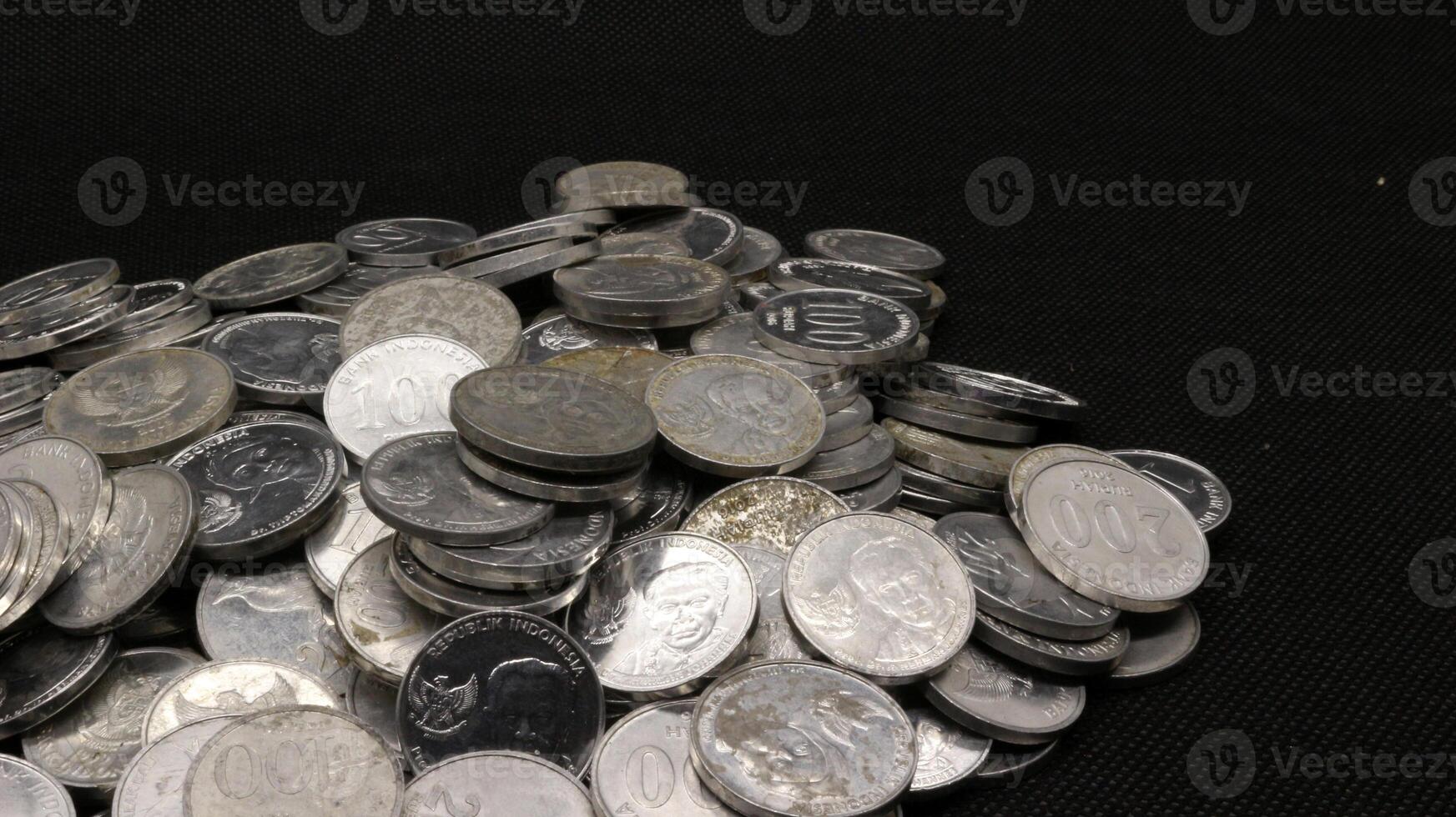 Stack of Indonesian coins isolated photo