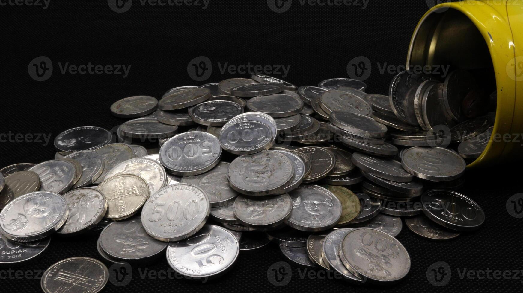 Stack of Indonesian coins isolated photo