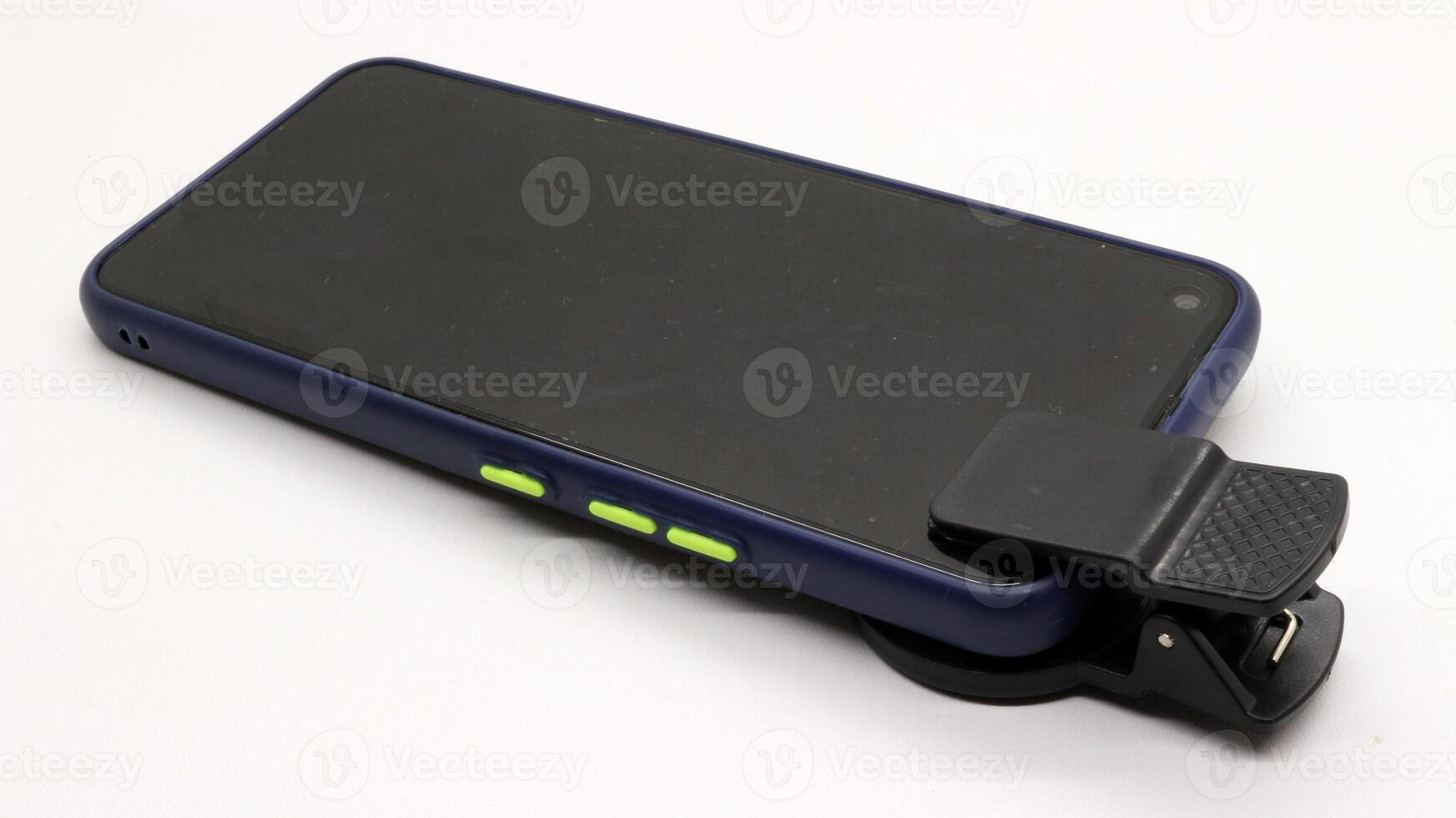 Attachable camera lens on smart phone photo