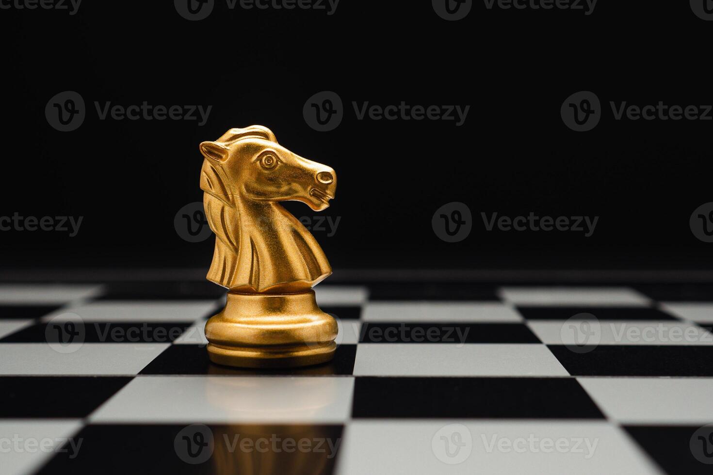 Chess piece on board game planning and competition on black background photo