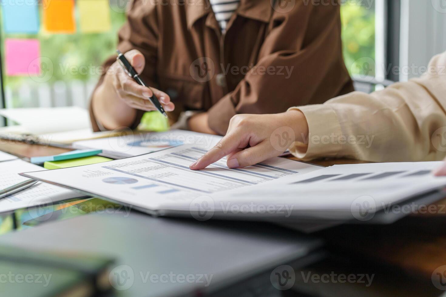 Business People brainstorming Meeting Design Ideas use post it notes to share idea professional investor start up project business brainstorming planning in office photo