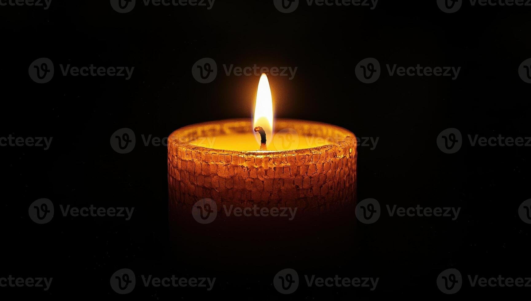 Burning candle in the dark. Concept of memory, hope, and remembrance. photo