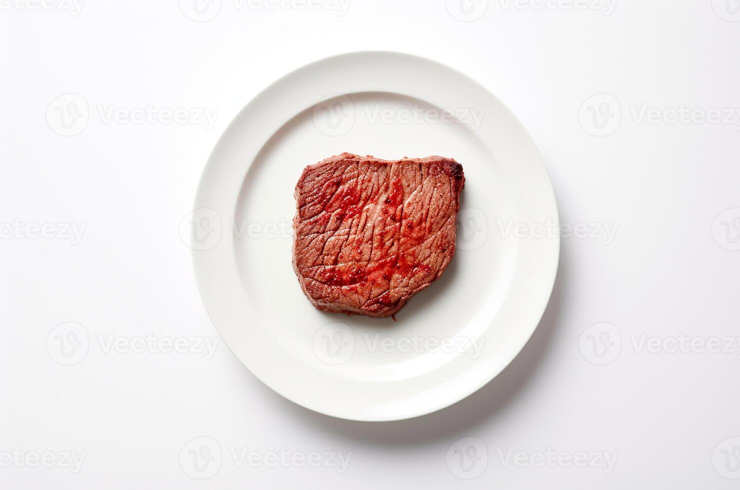 Piece of beef steak on a plate on a white background photo