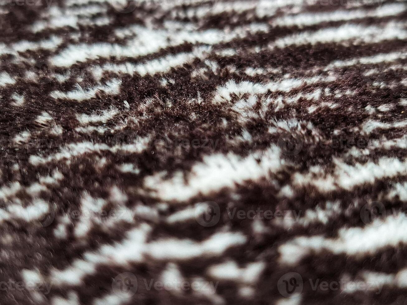 Fill inframe photo, close up of a carpet pattern. Soft fur carpet. Suitable for your home. photo