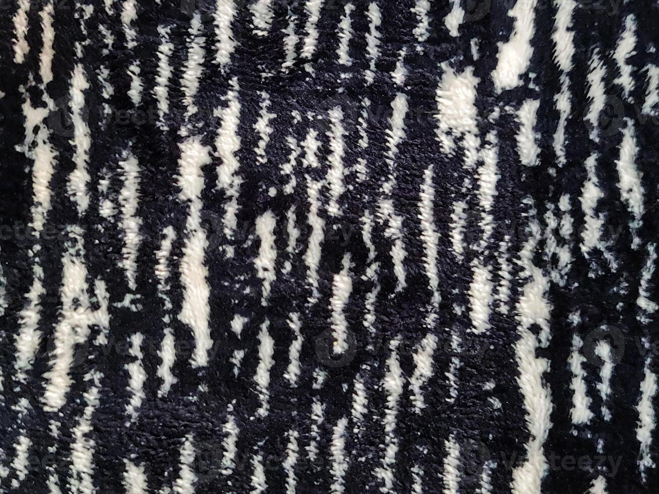 Fill inframe photo, close up of a carpet pattern. Soft fur carpet. Suitable for your home. photo
