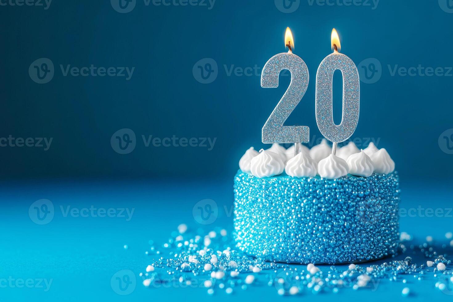 Silver numbers on a blue background. Candles with numbers 20. Birthday celebration concept. photo