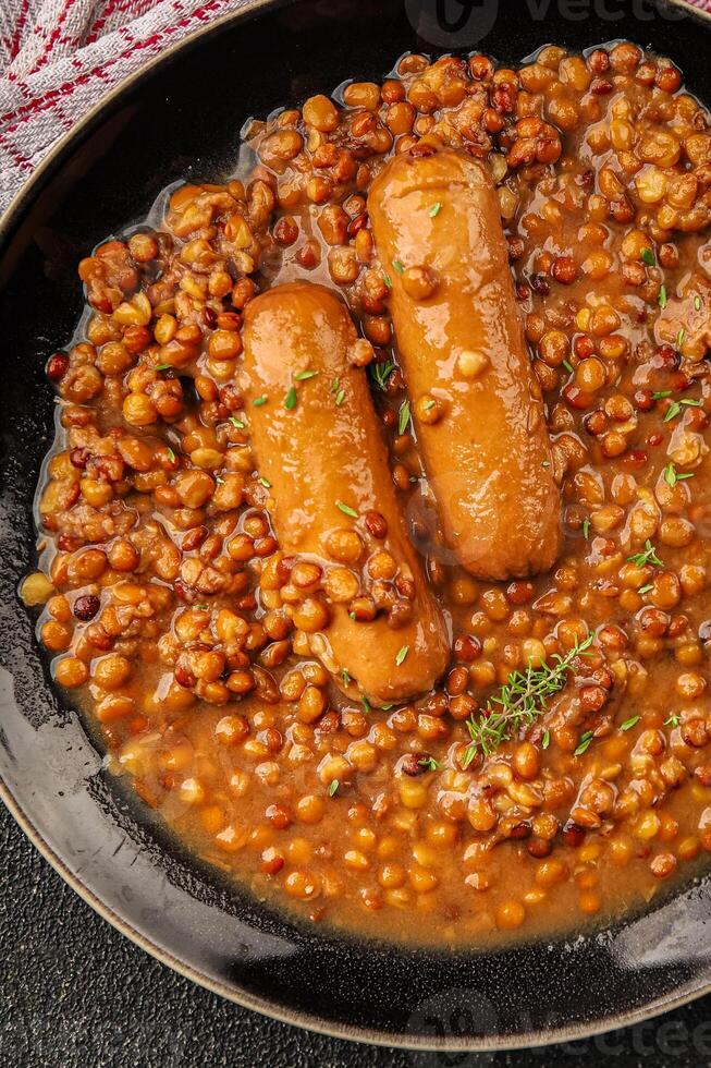 Lentil with sausage tasty food dish second course fresh gourmet food background on the table rustic food top view copy space top view photo