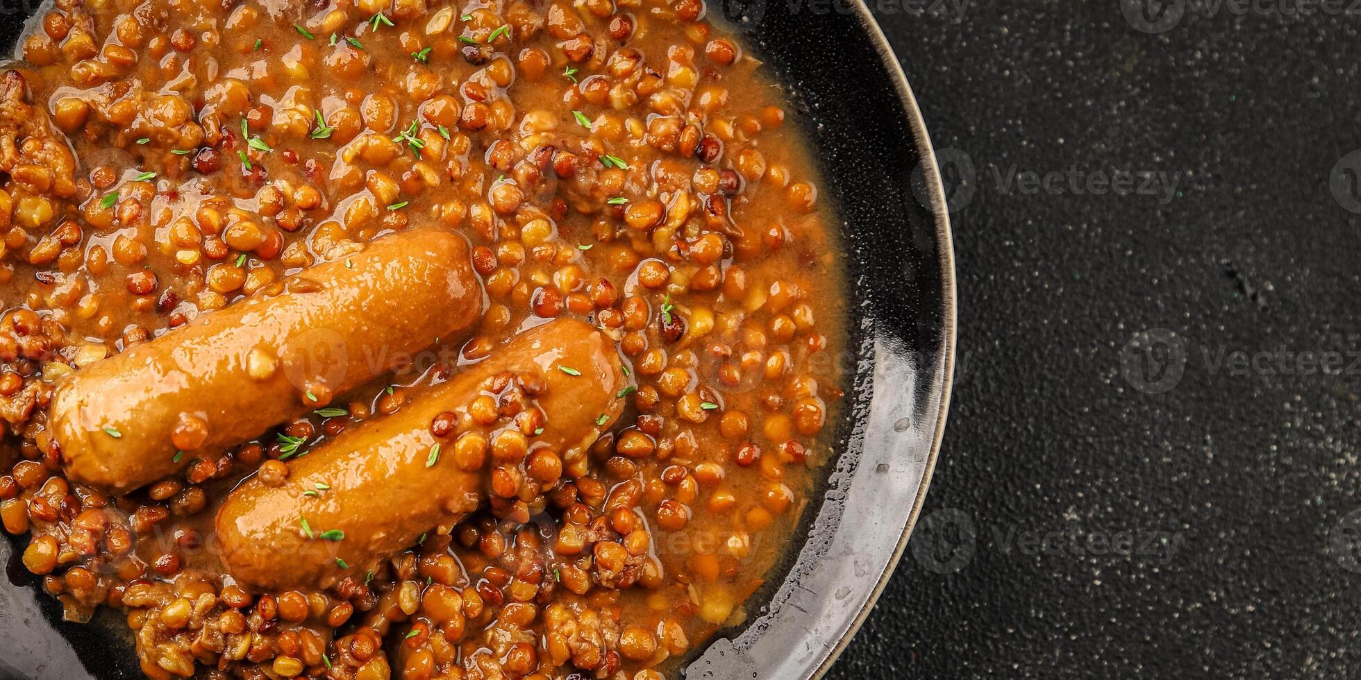 Lentil with sausage tasty food dish second course fresh gourmet food background on the table rustic food top view copy space top view photo
