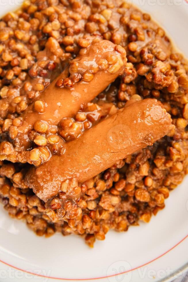 Lentil with sausage tasty food dish second course fresh gourmet food background on the table rustic food top view copy space top view photo