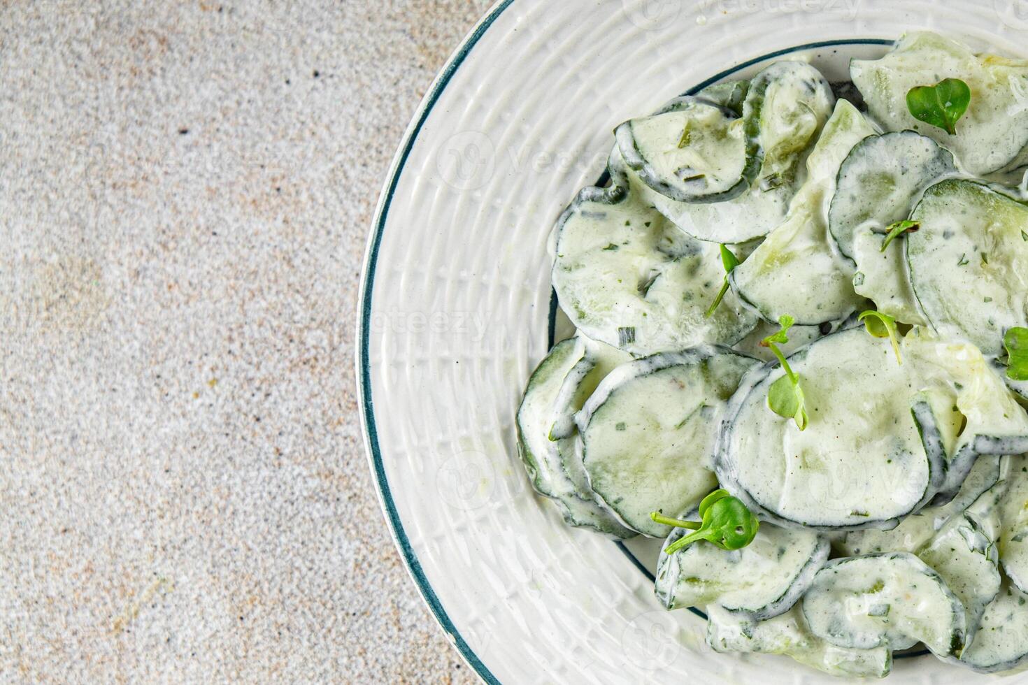 cucumber salad fresh cream tasty food dish fresh delicious gourmet background on the table rustic food top view copy space top view keto and paleo diet Vegetarian and vegan food photo