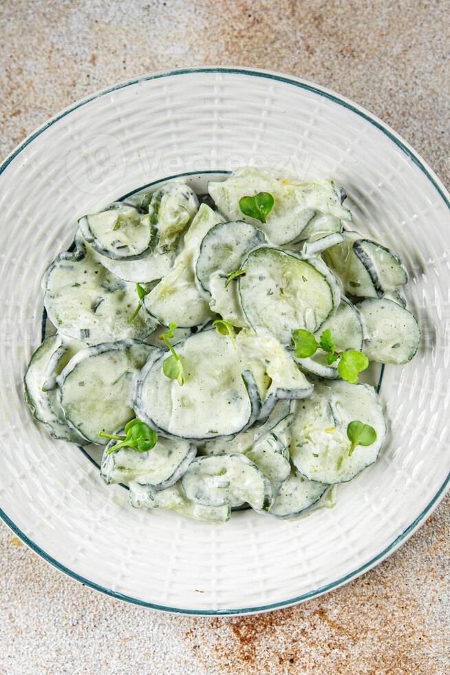 cucumber salad fresh cream tasty food dish fresh delicious gourmet background on the table rustic food top view copy space top view keto and paleo diet Vegetarian and vegan food photo
