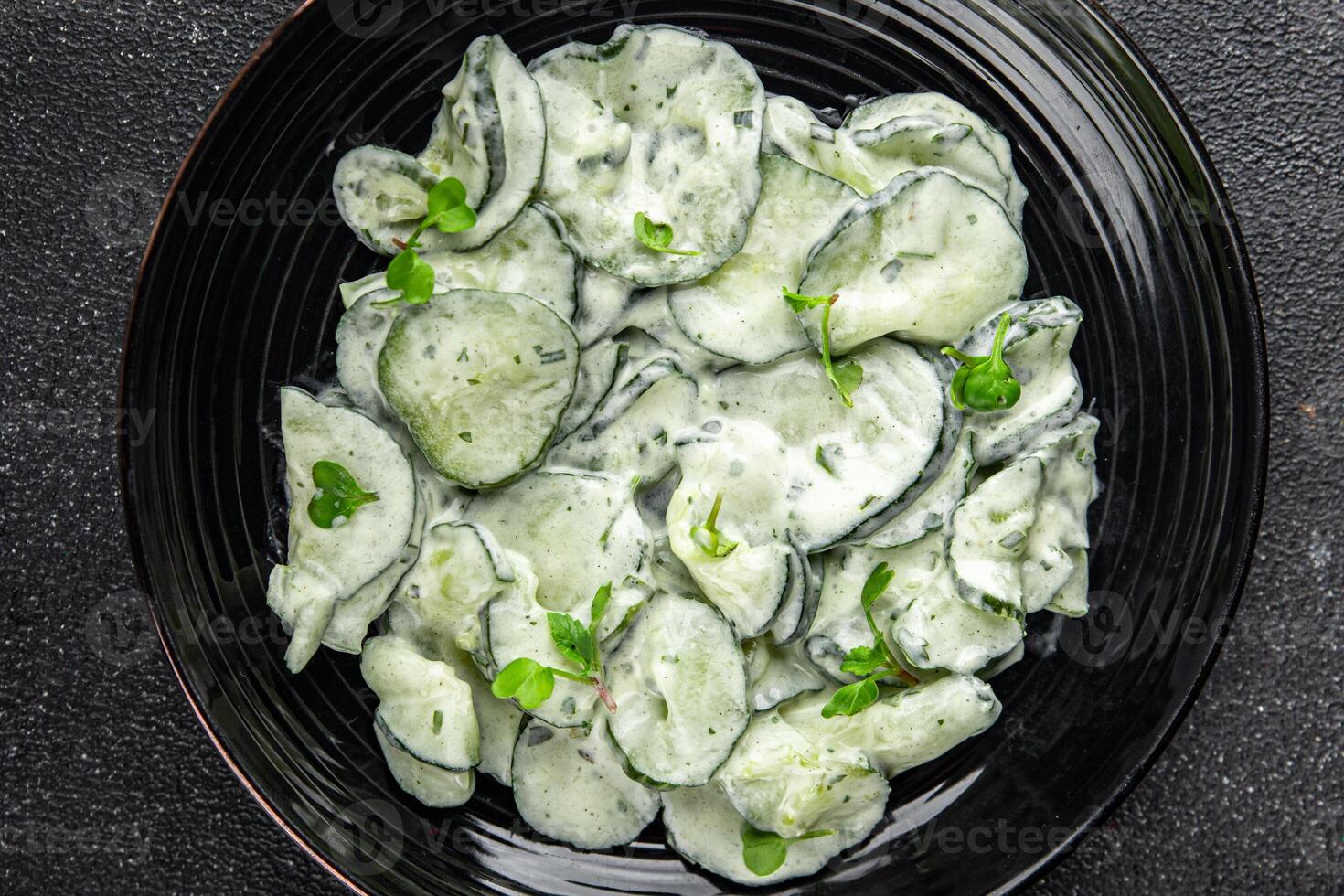 cucumber salad fresh cream tasty food dish fresh delicious gourmet background on the table rustic food top view copy space top view keto and paleo diet Vegetarian and vegan food photo