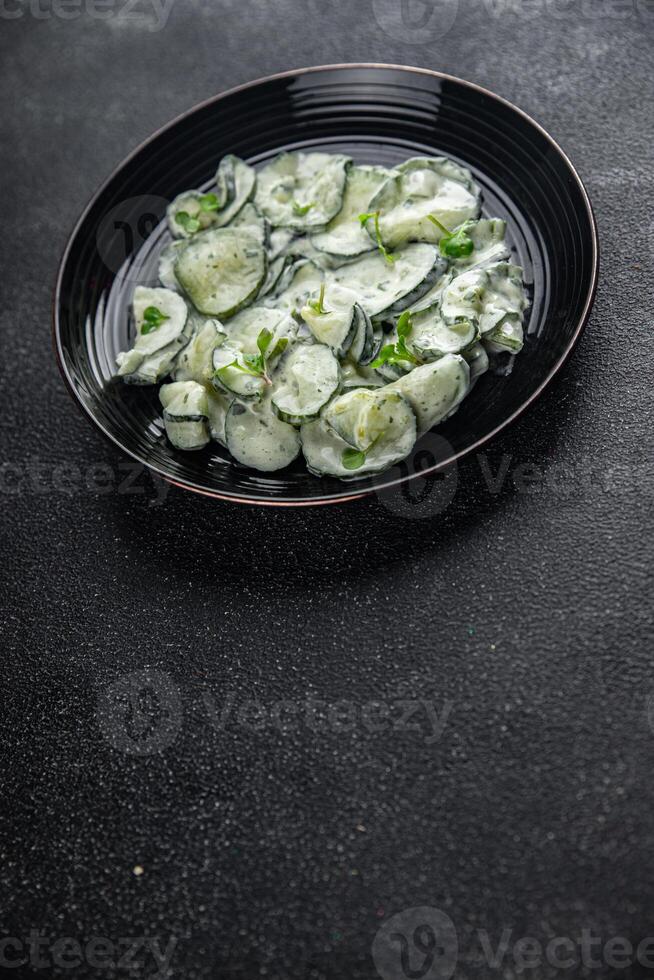 cucumber salad fresh cream tasty food dish fresh delicious gourmet background on the table rustic food top view copy space top view keto and paleo diet Vegetarian and vegan food photo