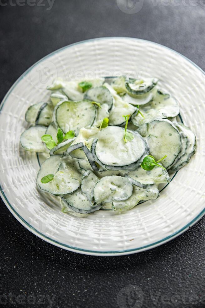 cucumber salad fresh cream tasty food dish fresh delicious gourmet background on the table rustic food top view copy space top view keto and paleo diet Vegetarian and vegan food photo