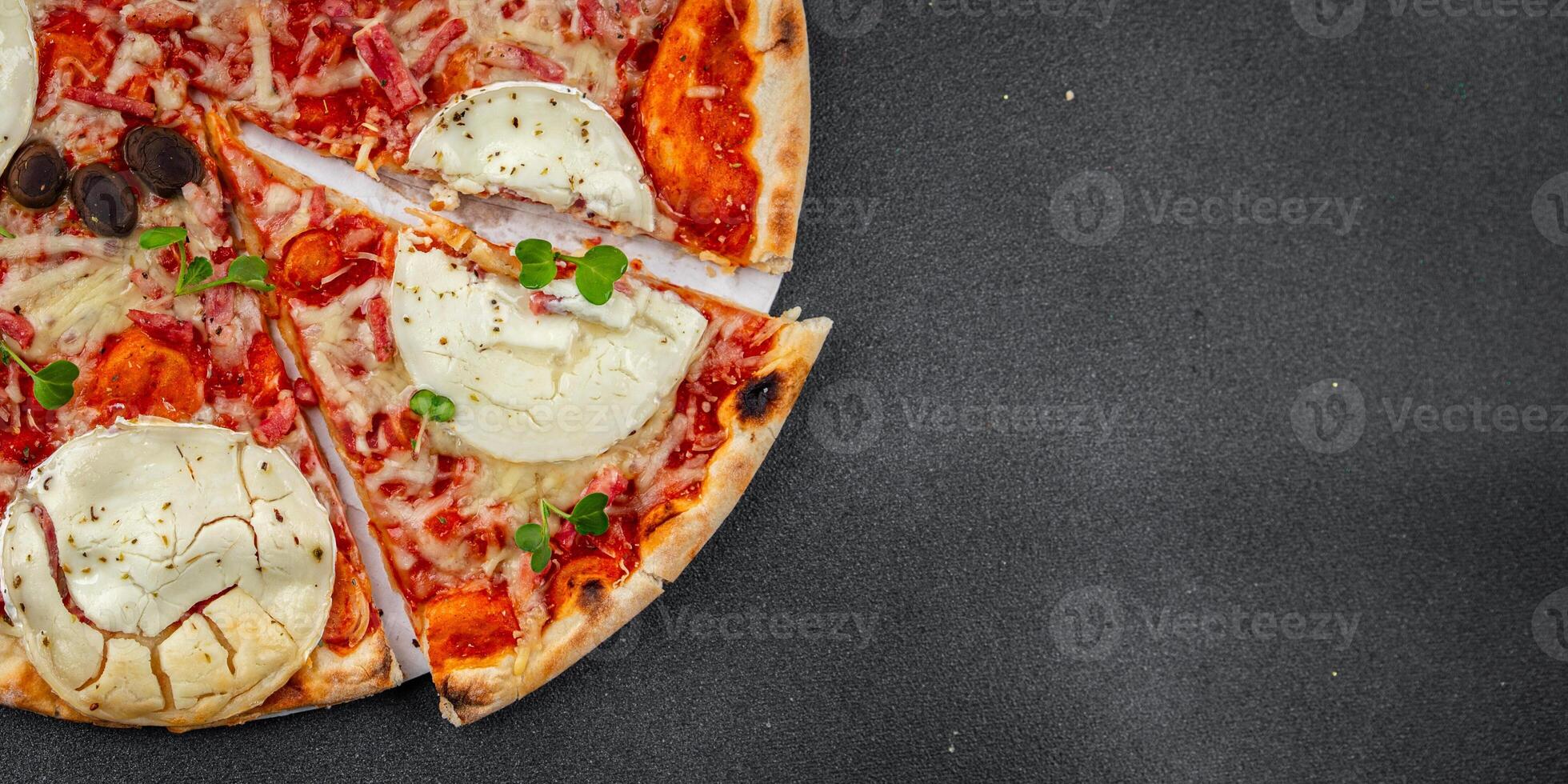 Pizza goat cheese, tomato sauce, bacon tasty food dish fresh delicious gourmet food background on the table rustic food top view copy space top view photo
