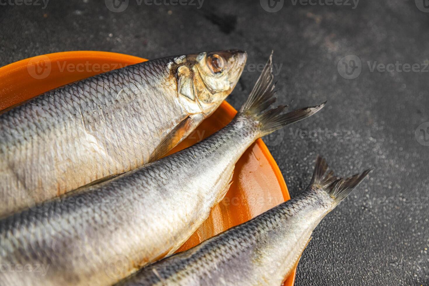 Herring fresh fish seafood pescetarianism tasty food dish fresh delicious gourmet food background on the table rustic food top view copy space top view keto and paleo diet vegetarian photo