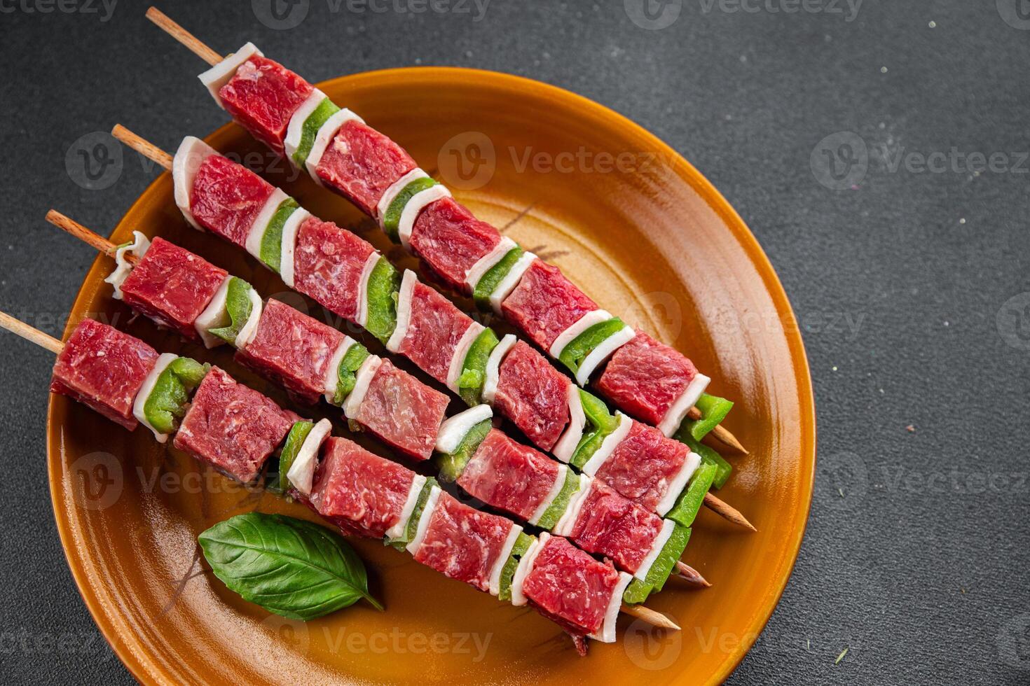 meat kebab raw vegetable, beef, lard, pepper dish fresh gourmet food background on the table rustic food top view copy space photo