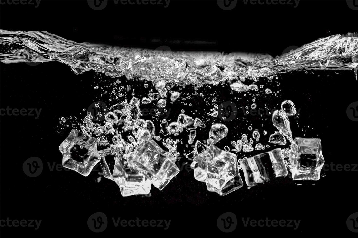 Dynamic Splash of Ice Cubes in Water Captured in High-Speed Photography Against a Black Background photo