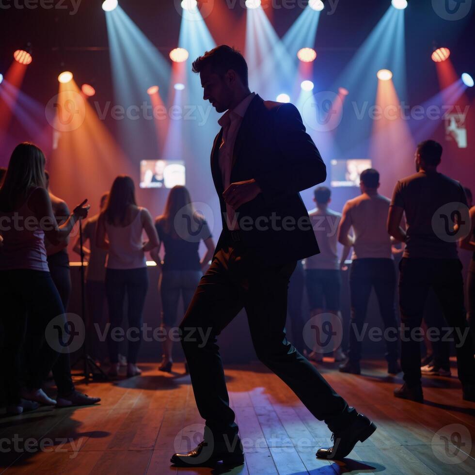 A man dancing at a nightclub photo
