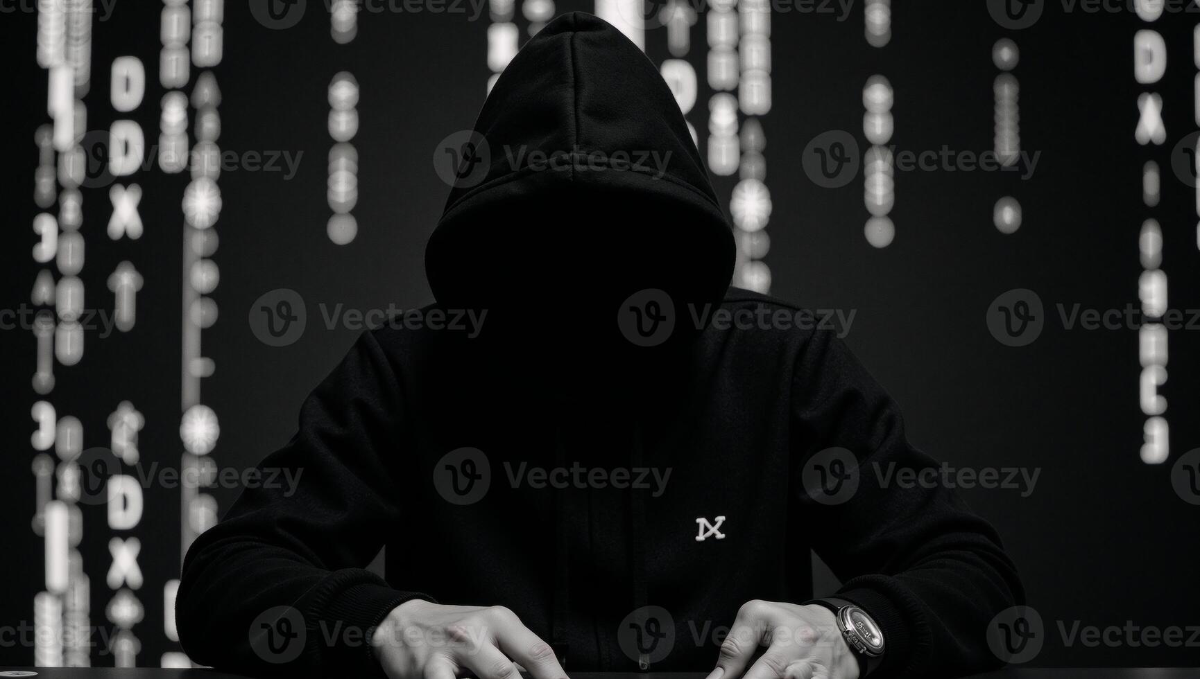 Image portrays a Matrixinspired hackers silhouette wearing a hoodie with distinctive patterns photo