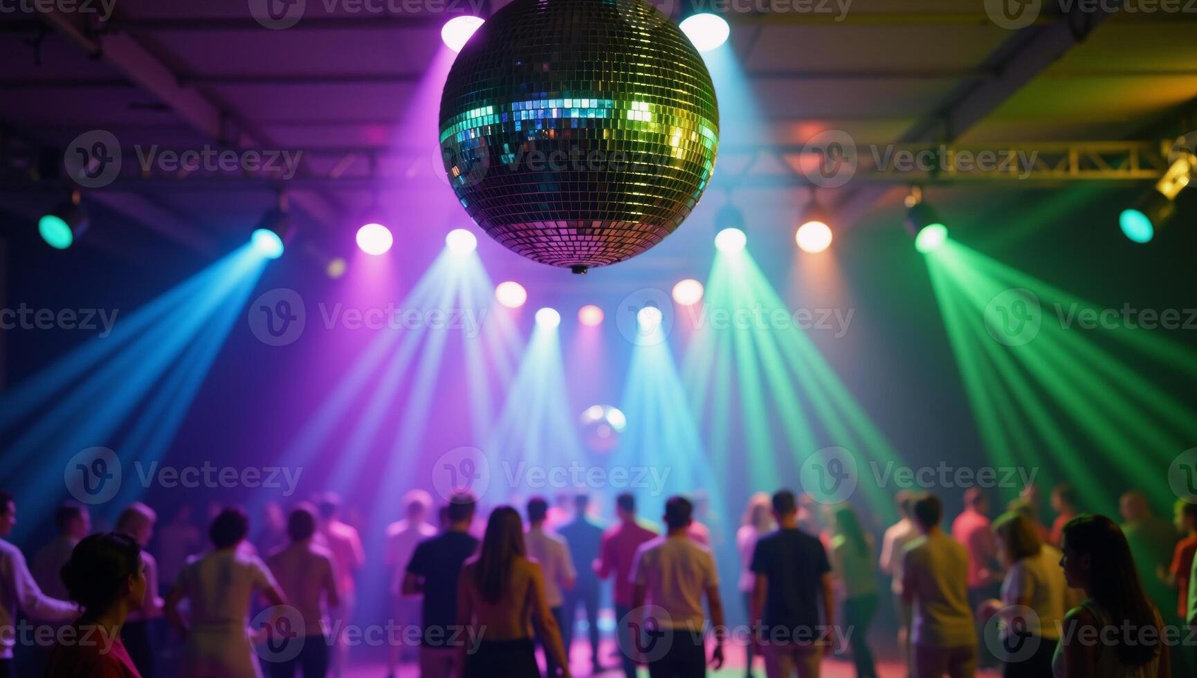 A disco ball illuminates the dancefloor with rainbow beams and swirling bokeh lights behind photo