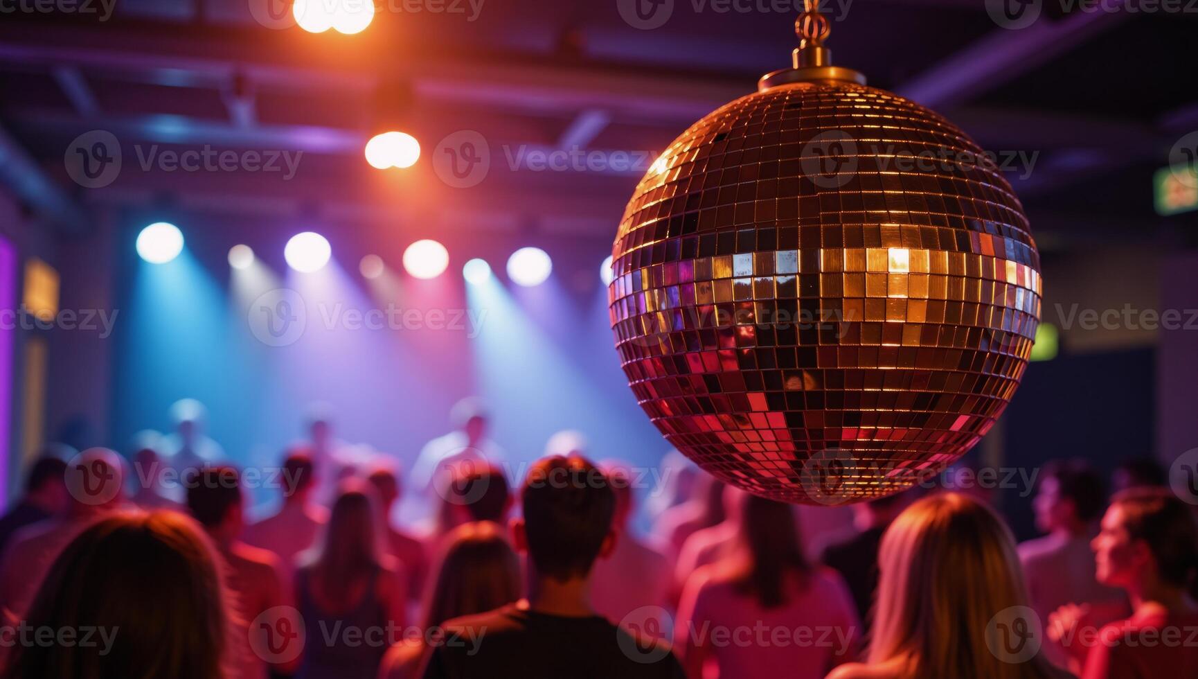 Retrostyle image featuring a shiny gold disco ball reflecting vibrantly at an energetic lively party photo