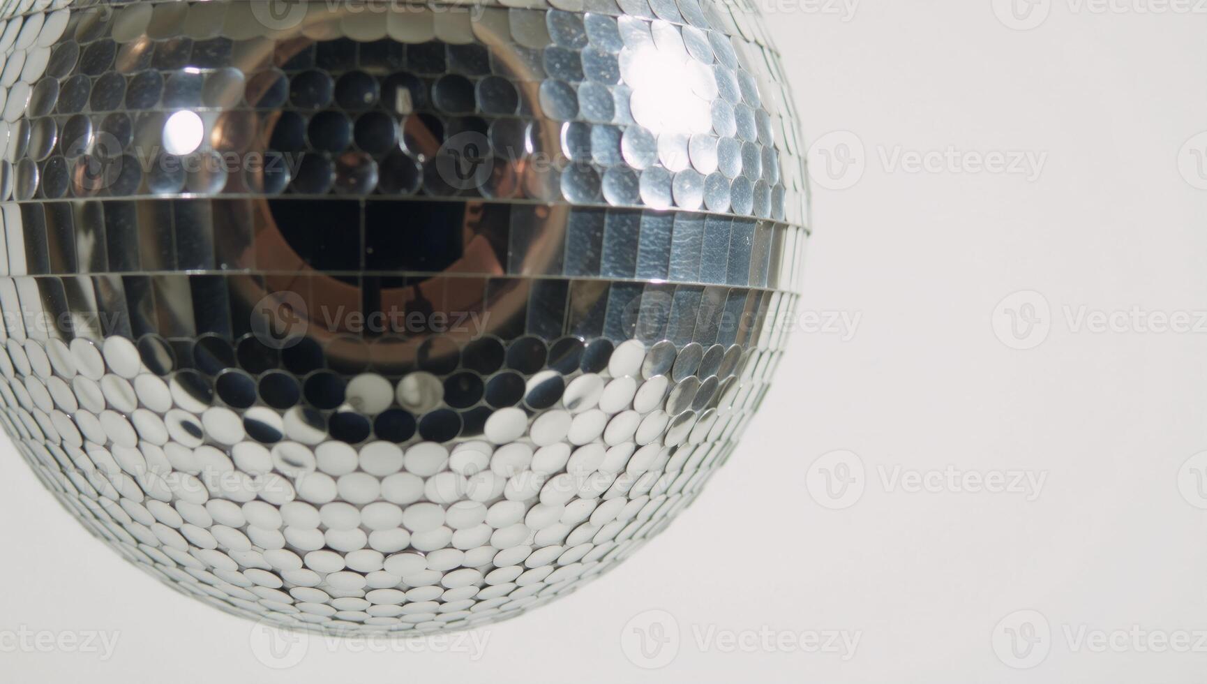 A simple line drawing showcasing a 70sstyle disco ball photo