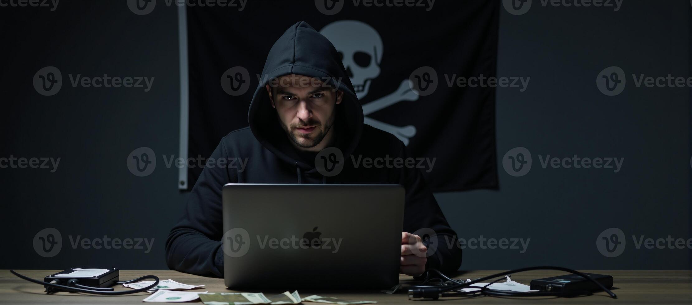 Hooded hacker depicted with computer working on illicit activities in a cybersecurity context piracy banks money highresolution portrait photo
