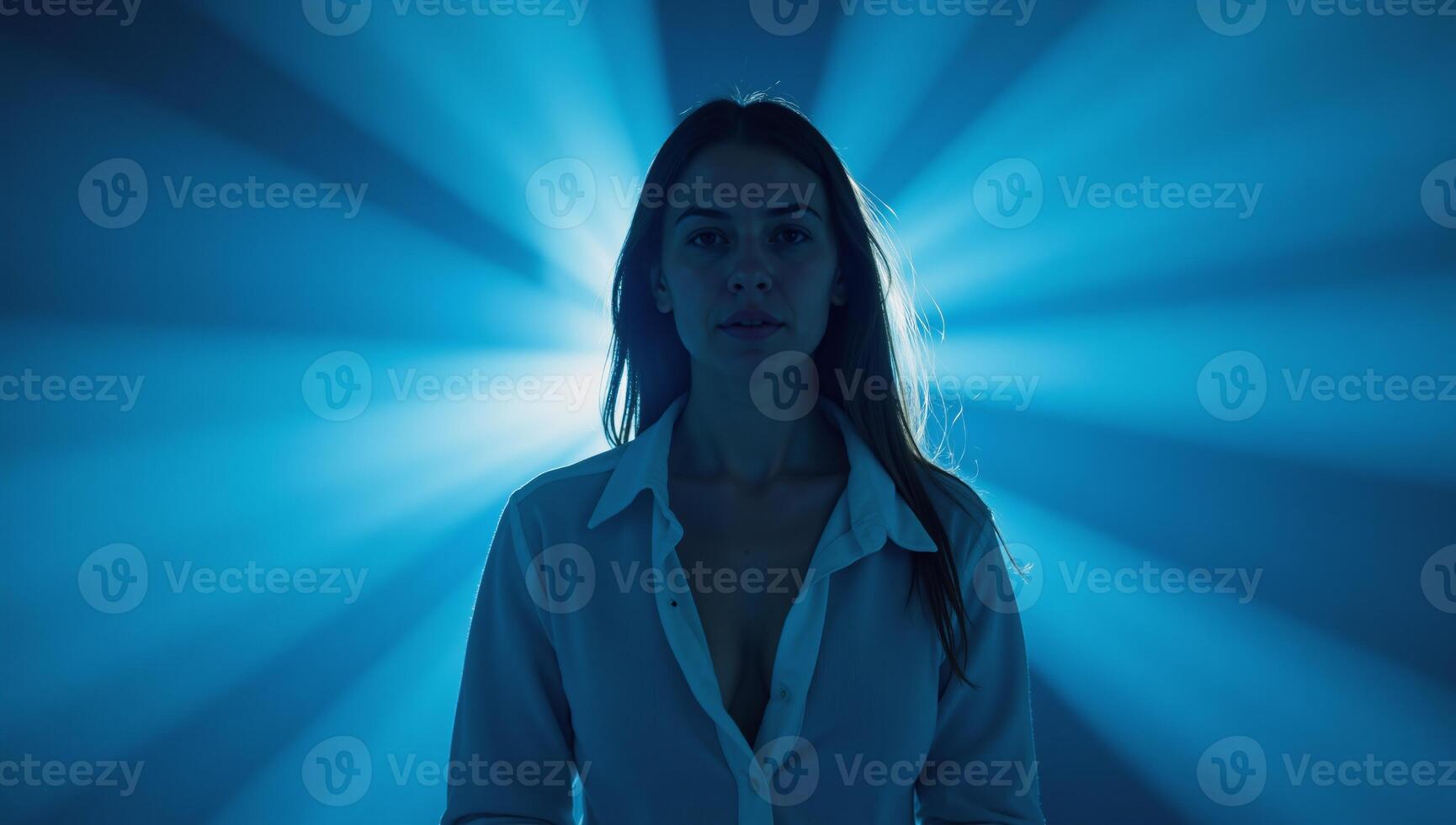 A blue asphalt backdrop with sunbeam accents photo