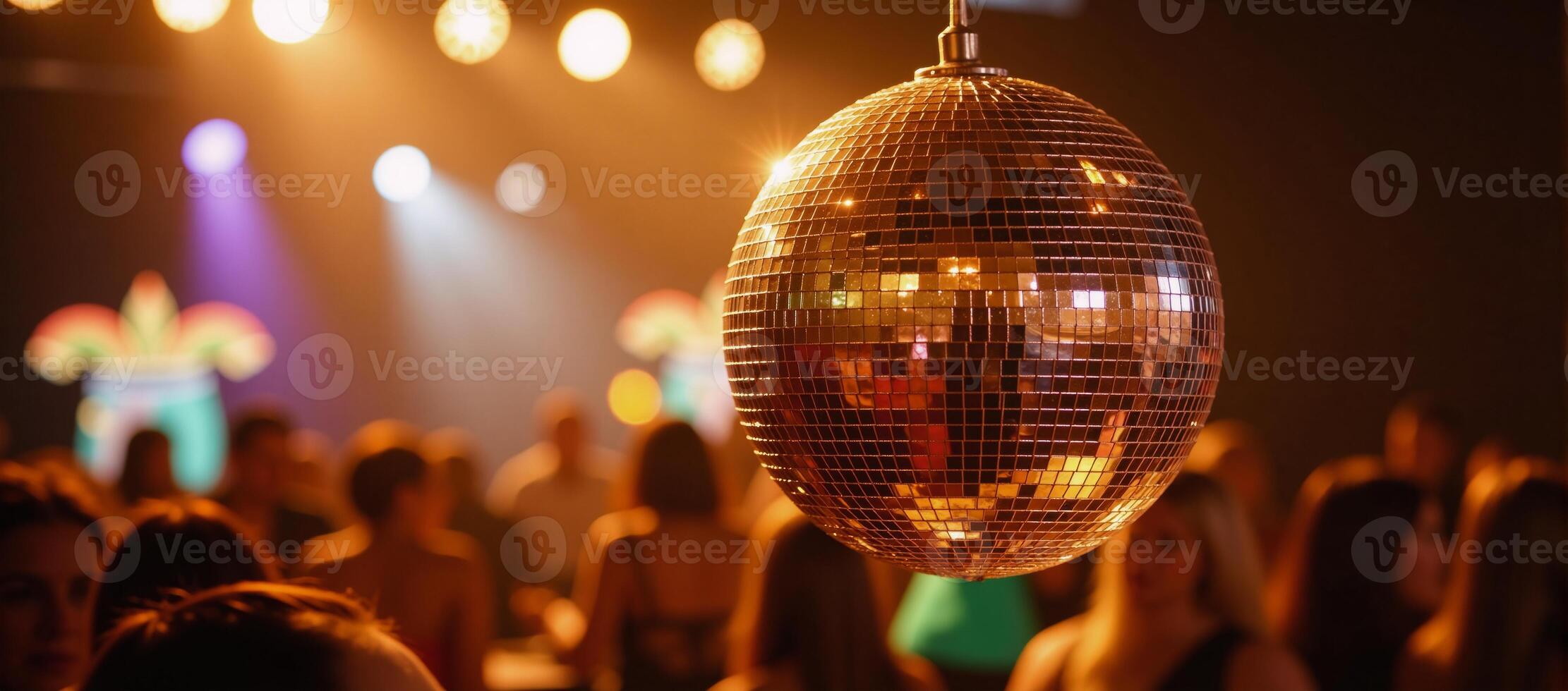 Vibrant disco ball creates shining reflections amidst festive setting emphasizing a lively and glittering party atmosphere bokeh effect photo