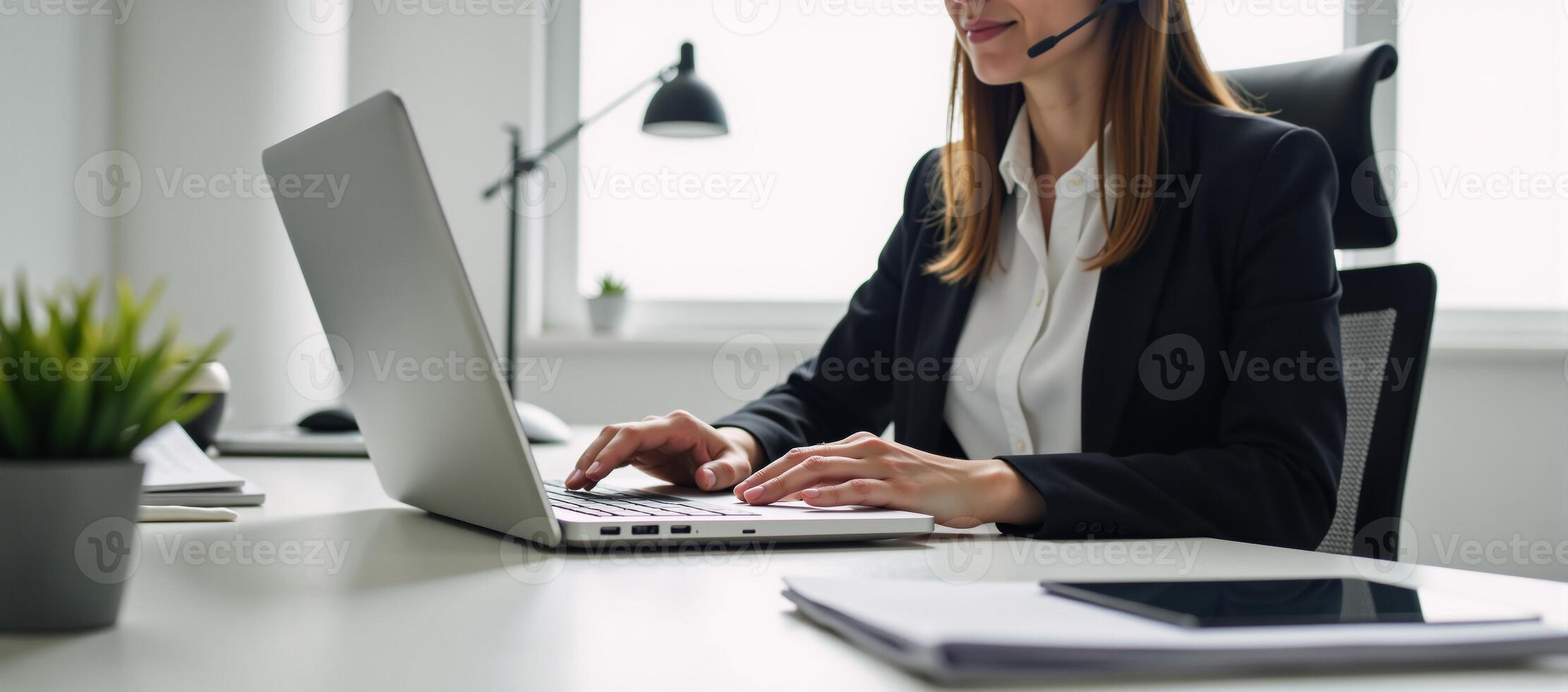 A dedicated technical support expert working efficiently in a streamlined office environment photo