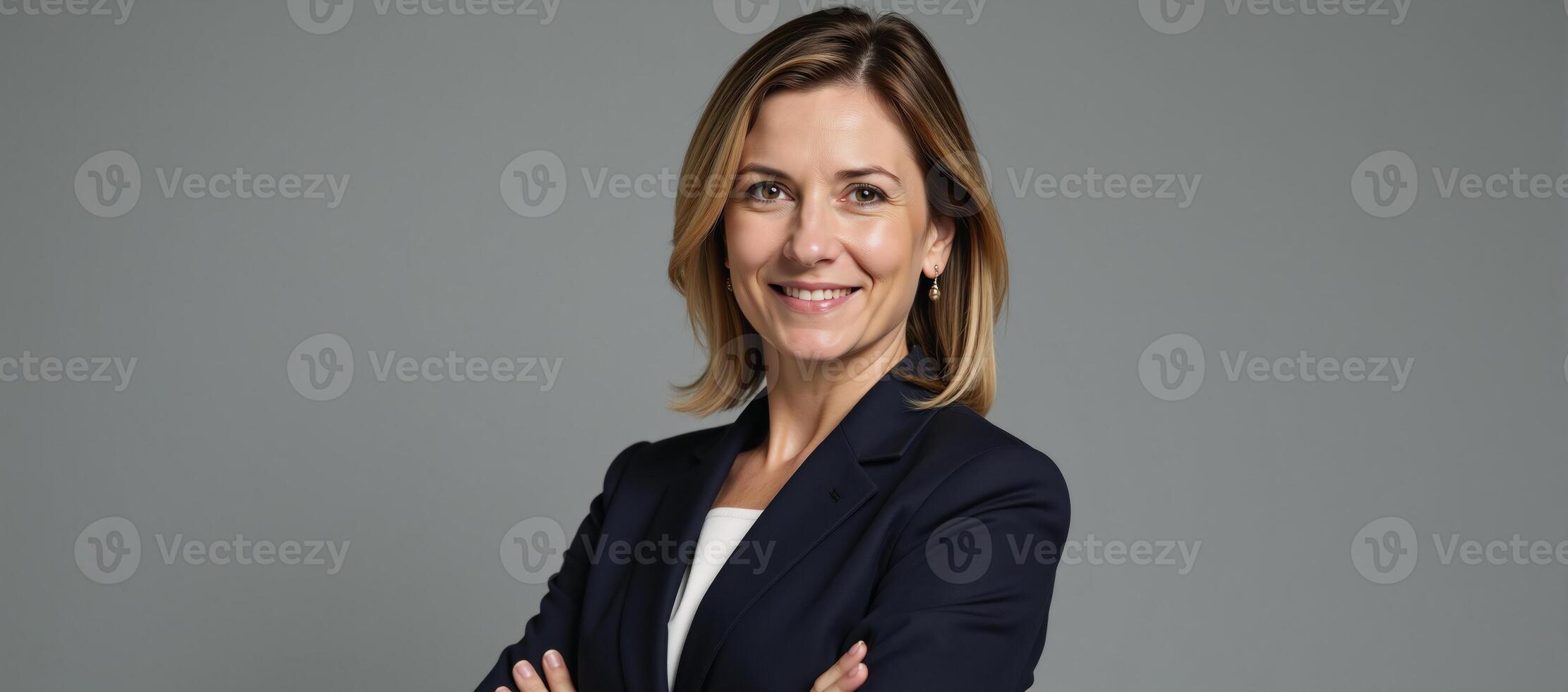 A professional yet approachable image featuring a confident middleaged HR manager exuding an executive demeanor photo