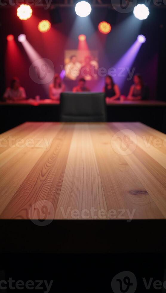 An empty wooden table stands amidst a blurred disco club backdrop for product demonstration photo