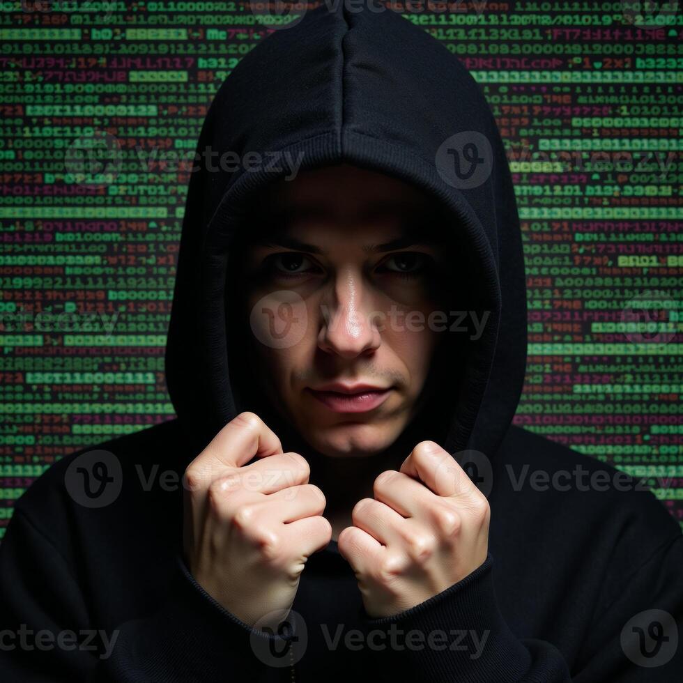 A hooded hacker amidst glitchy computer code glitch art photo