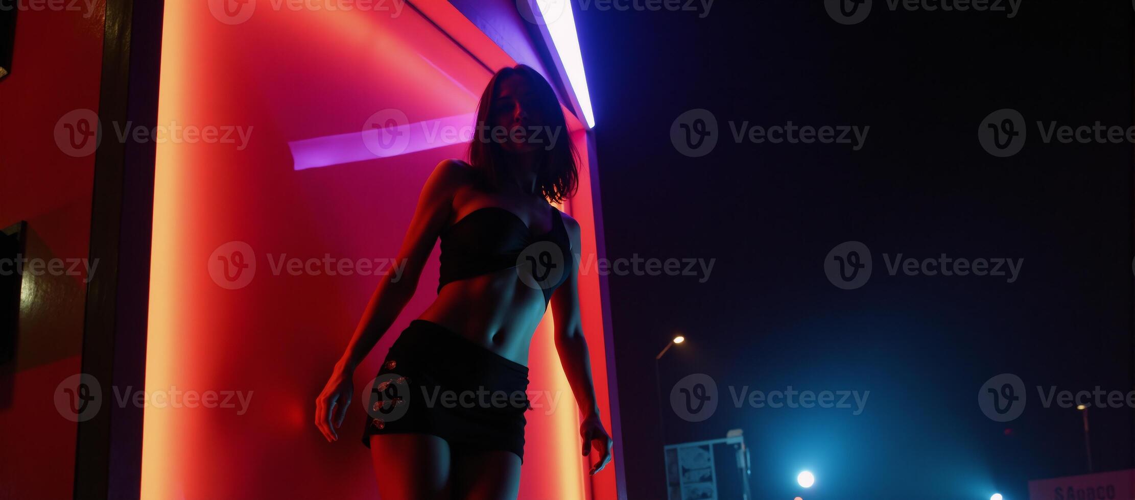 Vibrant neonlit silhouette of a stylish female figure set against a dark backdrop with a retrofuturistic nightclub atmosphere photo