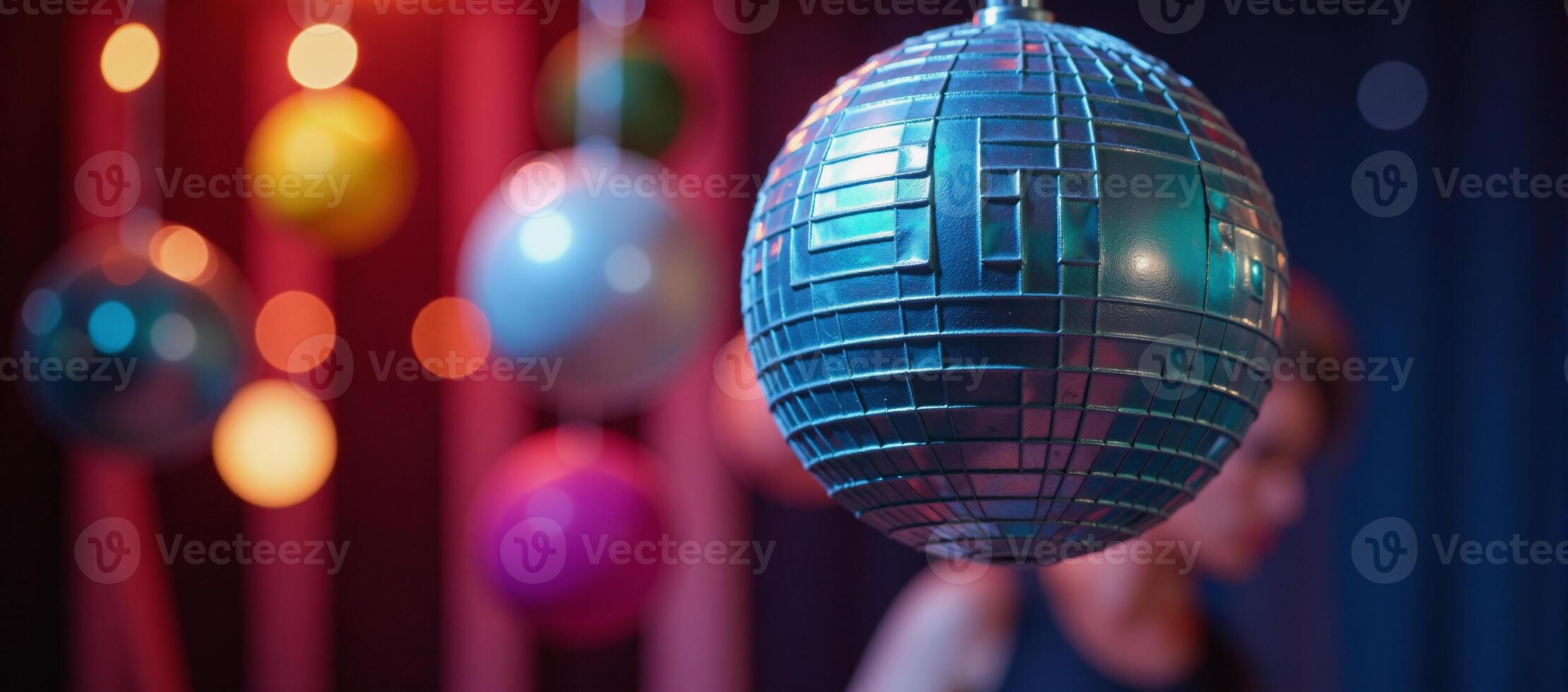 A whimsical colorful party decoration featuring an inflatable balloon photo
