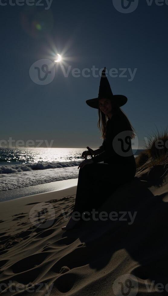 Minimalist Halloween witch portrait on the beach highlighting mystery during spooky season photo