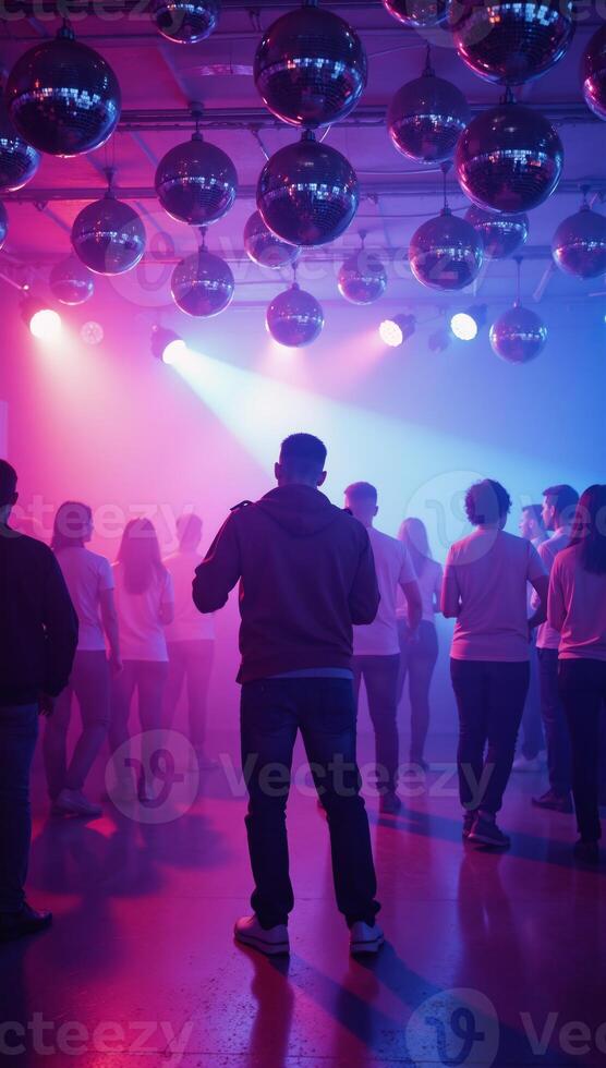 Vibrant disco balls illuminate a neonhazed futuristic dance floor for party and nightlife themes photo