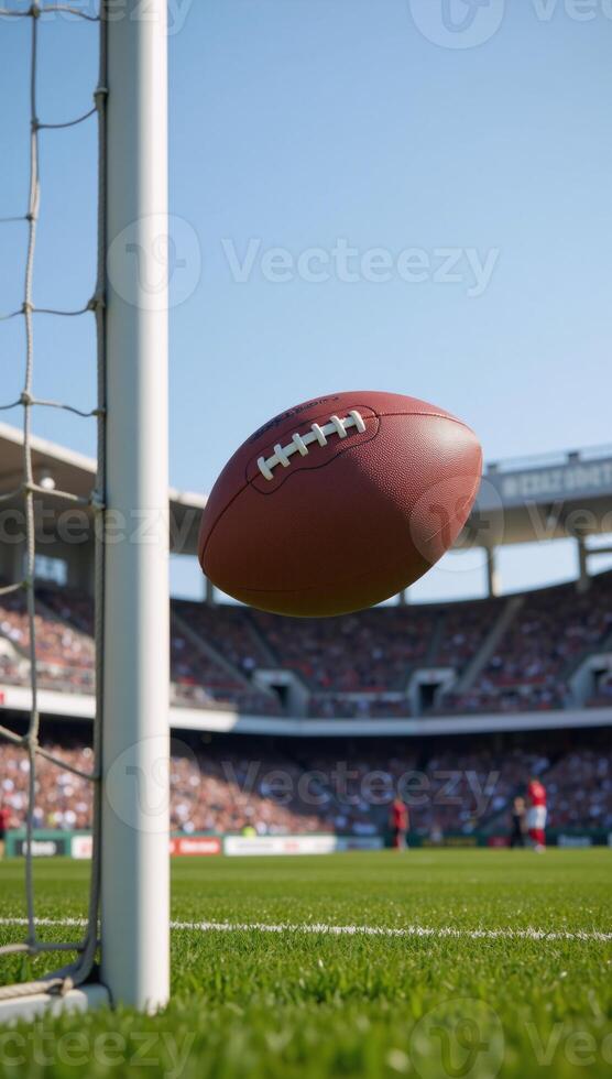 A 3D rendition of a football game with a ball helmet and goalposts within a stadium atmosphere photo