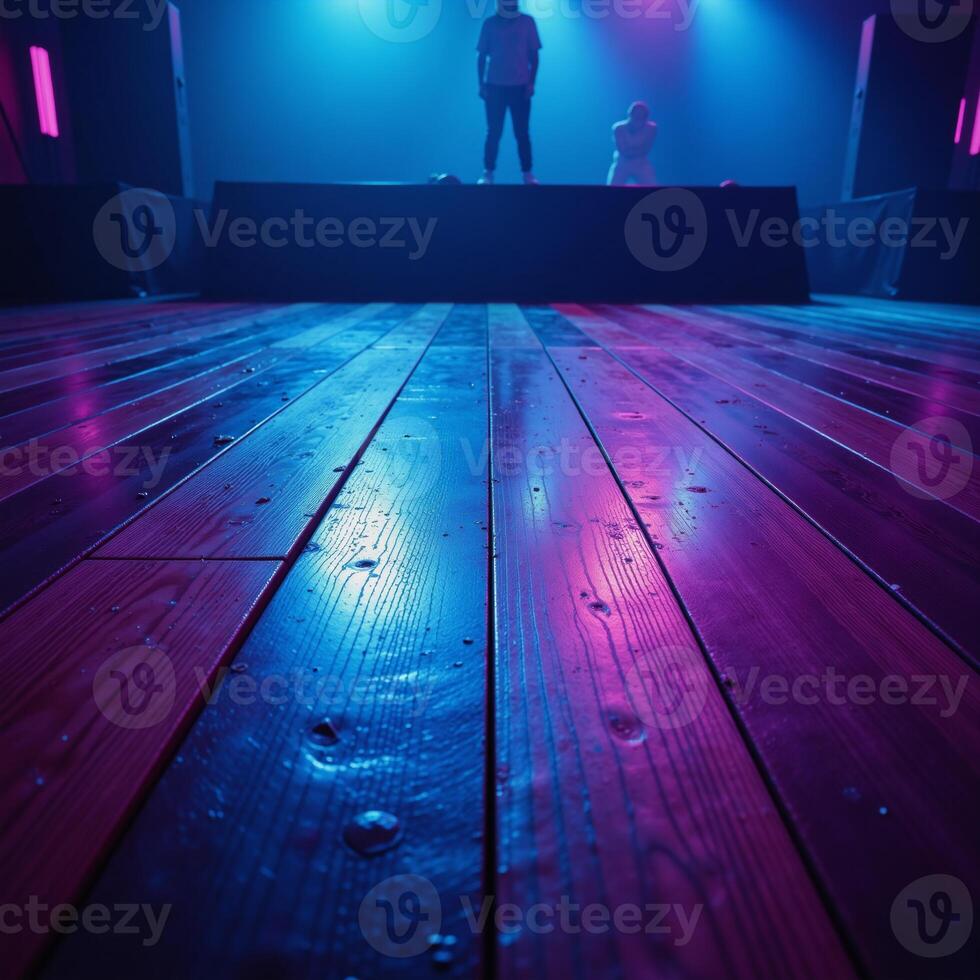 Neonlit empty rave dance floor at nighttime photo