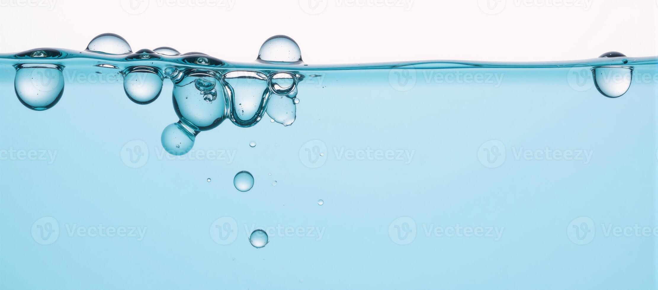 Top view of bubbly water in a blue basin against a white backdrop Isolated photo