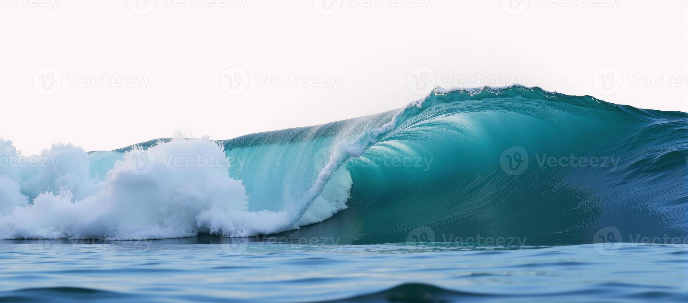 A closeup of an isolated blue ocean wave against a blank backdrop photo