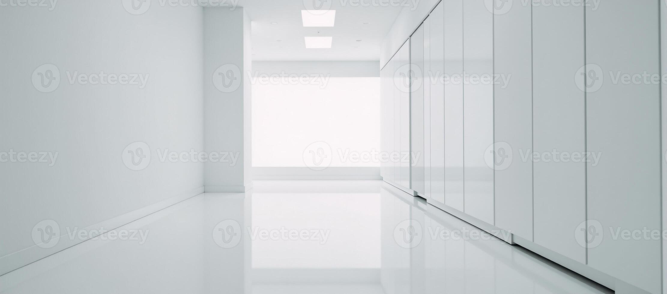 Large empty room featuring only white cabinets and a white floor photo
