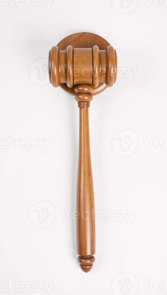 Wooden judges gavel on a plain backdrop embodies power fairness and legal principles photo