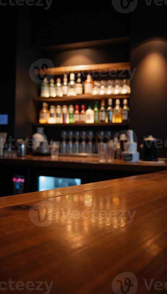 Blurry neon lights illuminate a woodtopped bar table photo