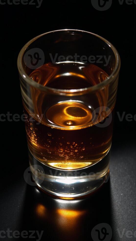 Topdown perspective of whiskey in a glass photo