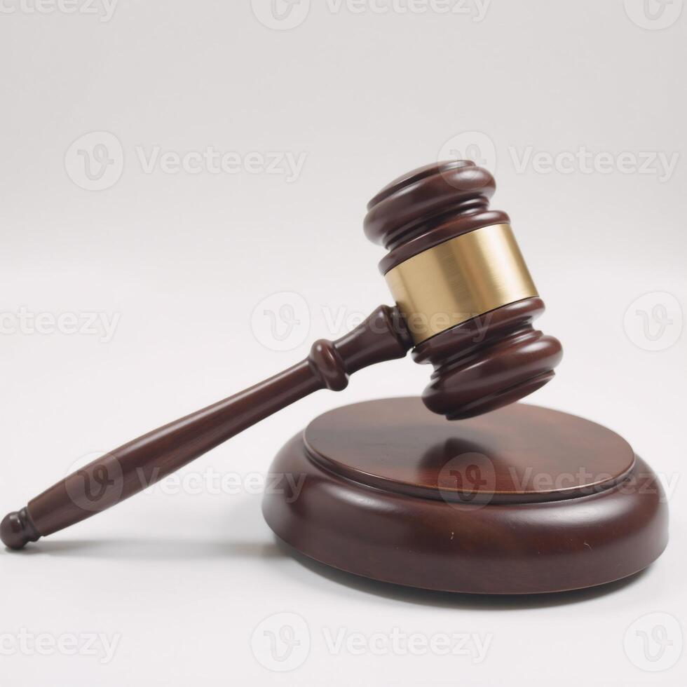 Wooden judges gavel on a plain backdrop embodies power fairness and legal principles photo