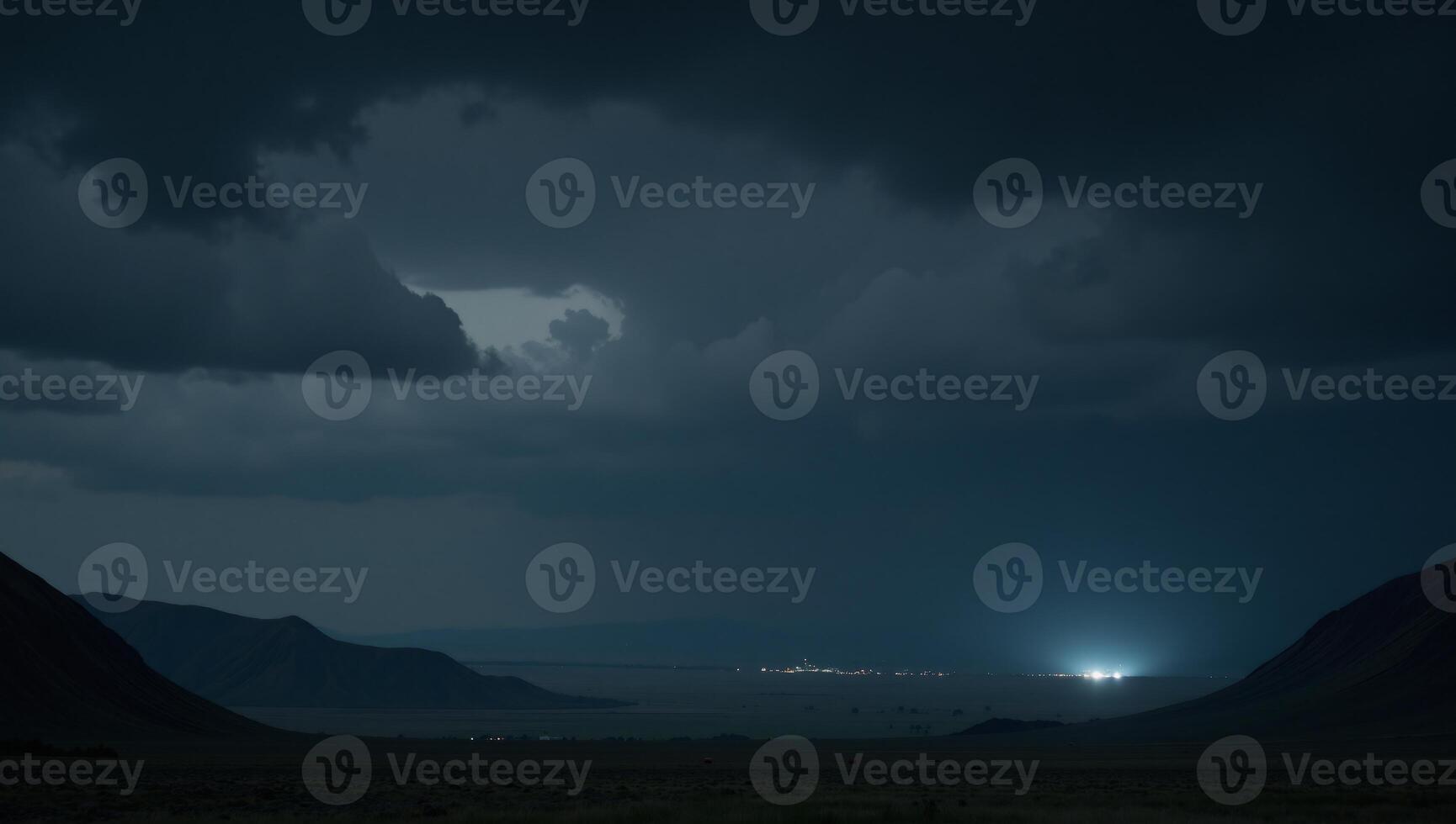 Stormy Halloweenthemed nightscape with looming cloud cover photo