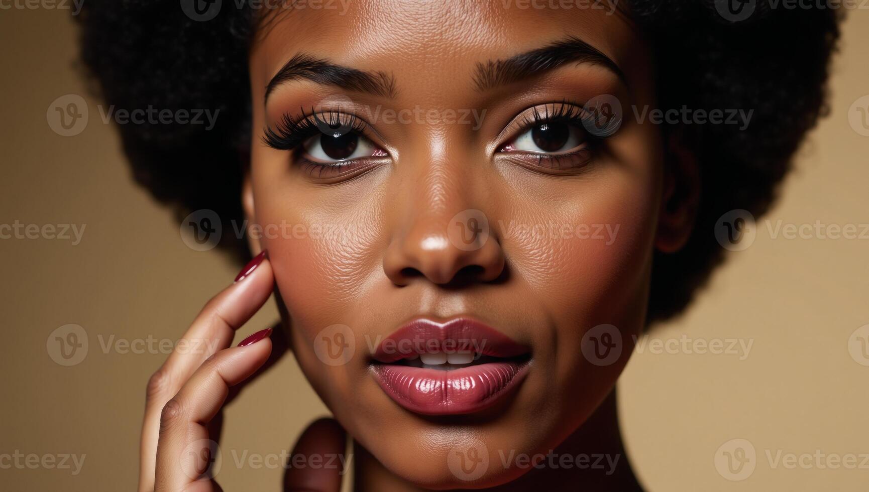 Closeup image of 1960s Afrocentric beauty with classic makeup and hair photo